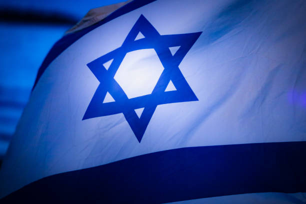 istock ISRAEL FLAG IN THE WIND 1192584498