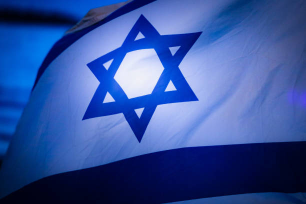 ISRAEL FLAG IN THE WIND ISRAEL FLAG IN THE WIND israeli flag photos stock pictures, royalty-free photos & images