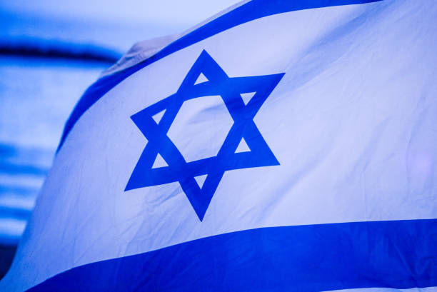 istock ISRAEL FLAG IN THE WIND 1192584506