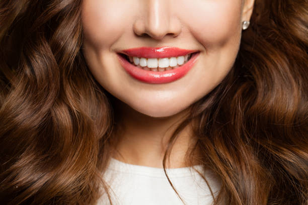 istock Pretty wemale smile with shite teeth close up 1192596004