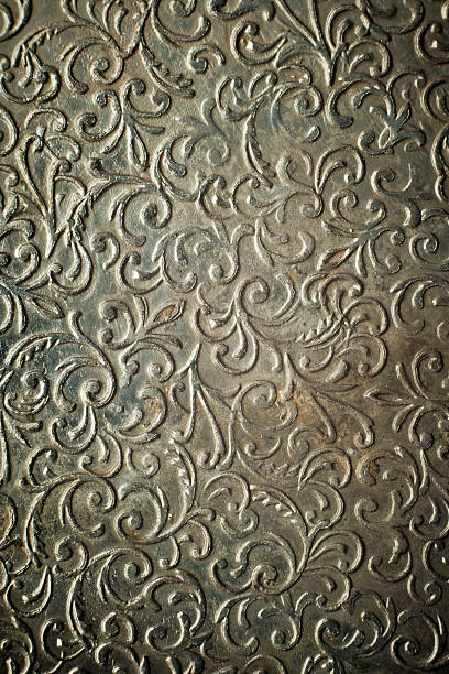 istock Vintage hammered metal ornament. 119259672