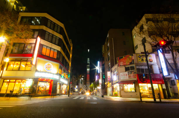 istock Night sky tree view from around Kinshicho in Tokyo, Japan 1192603746