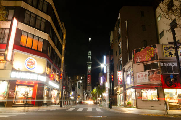 istock Night sky tree view from around Kinshicho in Tokyo, Japan 1192603749