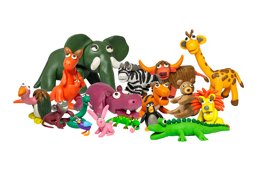 Statues like cute animals for children. Molding from plasticine. Cartoon characters like wild animals isolated on white background with clipping path.