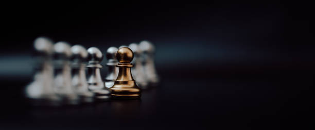 gold pawn of chess. unique, think different, individual and standing out from the crowd concept. panoramic image - individuality standing out from the crowd contrasts competition imagens e fotografias de stock