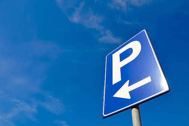 istock The sky is blue and there is a parking bay to the left 119260545