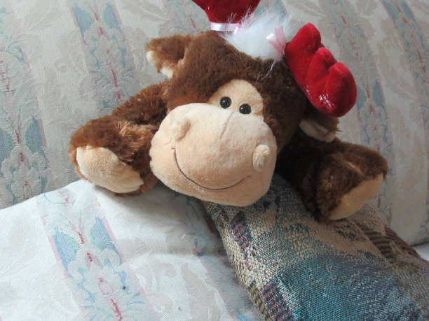 istock Adorable Christmas Reindeer Stuffed Toy 2019 1192606247