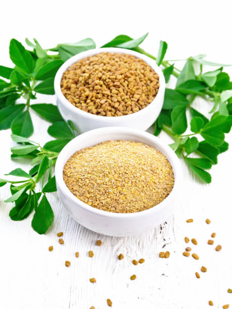 istock Fenugreek in two bowls with leaves on board 1192610699