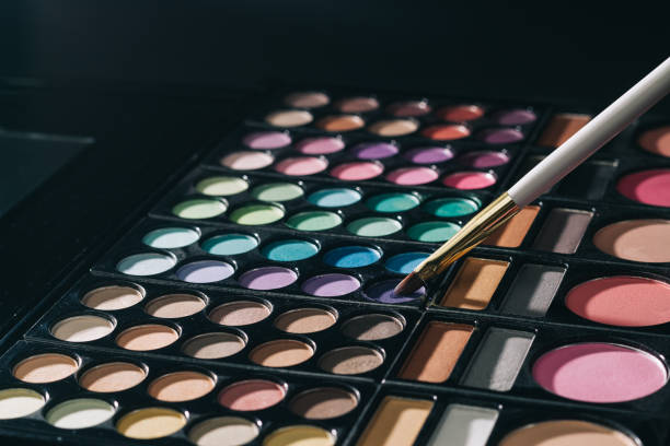 istock close up. makeup brush and beige eye shadow 1192612009