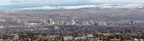 istock Reno, Nevada Pano with snow capped mountains 1192615086