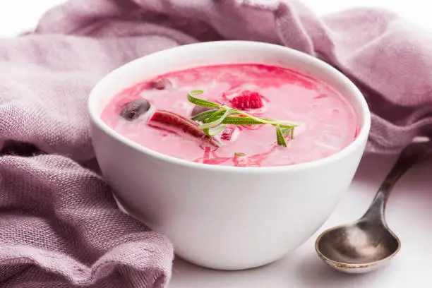 Beet root european soup called borscht with parsley