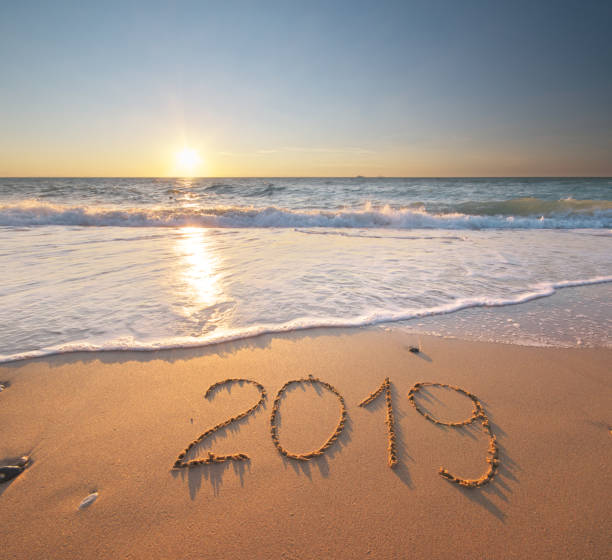 istock 2019 year on the sea shore. 1192617591