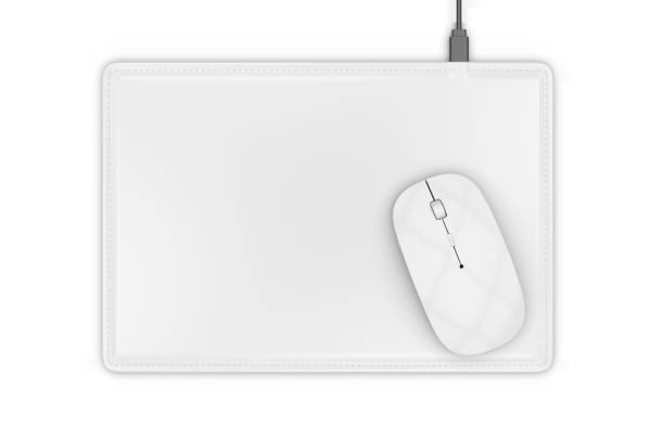 istock Blank Wireless Charging Mouse Pad with computer mouse for branding or design presentation. 3d render illustration. 1192618653