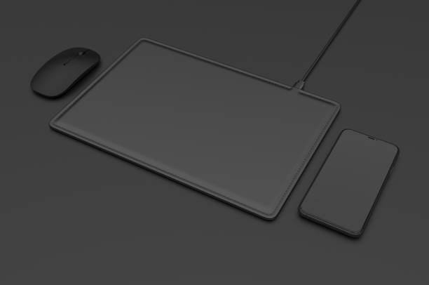 istock Blank Wireless Charging Mouse Pad with computer mouse for branding or design presentation. 3d render illustration. 1192619275