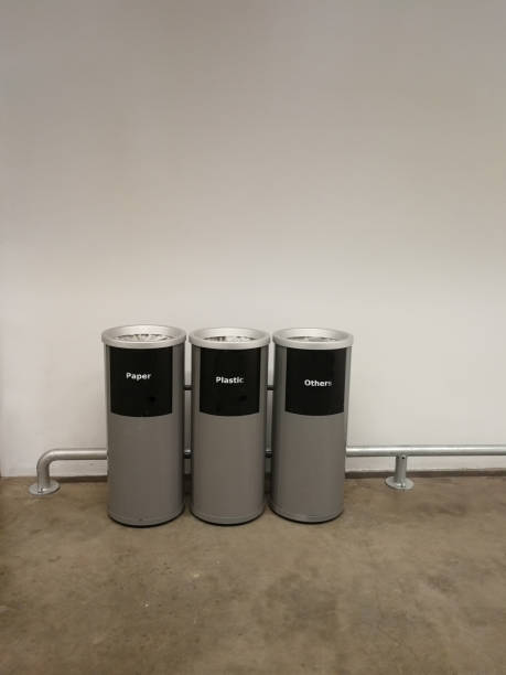 istock separate trash for recycle save earth in aluminium bin 1192621831