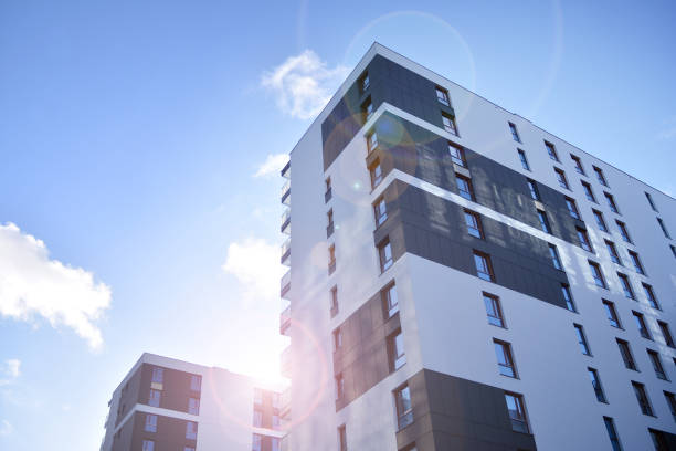 istock Modern apartment buildings on a sunny day with a blue sky. 1192624649