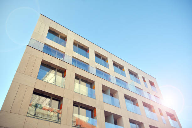 istock Modern apartment buildings on a sunny day with a blue sky. 1192624789