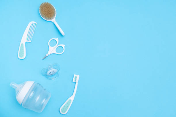 istock Sweet baby accessories on blue background . Copy space Top view Flat lay. 1192625732