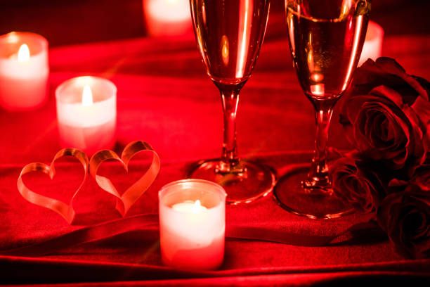 istock Champagne glasses and candles 1192626927