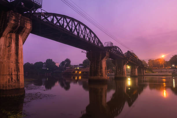 istock Kwai bridge at dawn with mist, Kanchanaburi 1192627094
