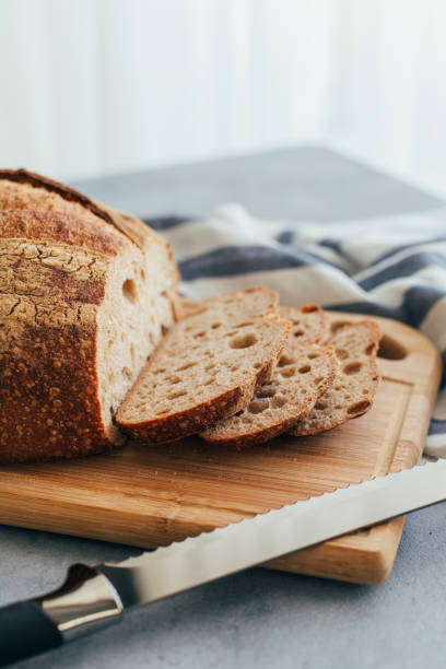 istock Freshly Baked Bread on Wooden Table 1192629589