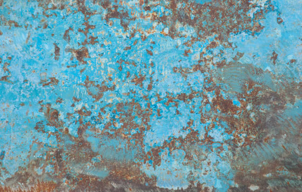 istock Sheet of old iron with traces of rust blue paint 1192630272