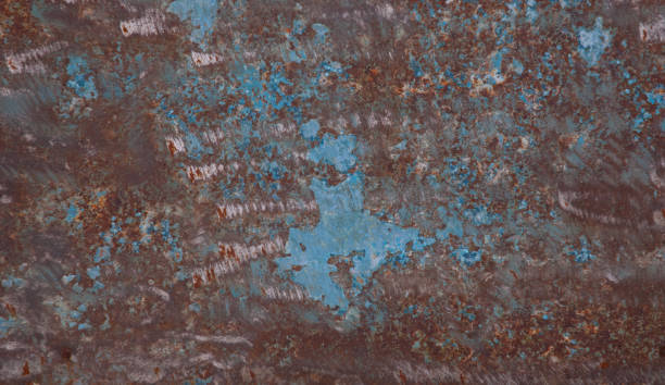 istock Sheet of old iron with traces of rust blue paint 1192630274