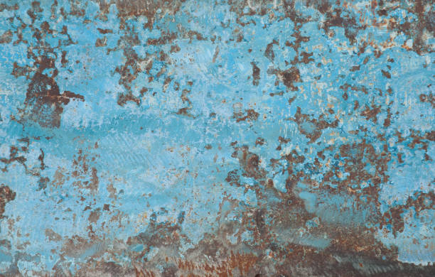 istock Sheet of old iron with traces of rust blue paint 1192630280
