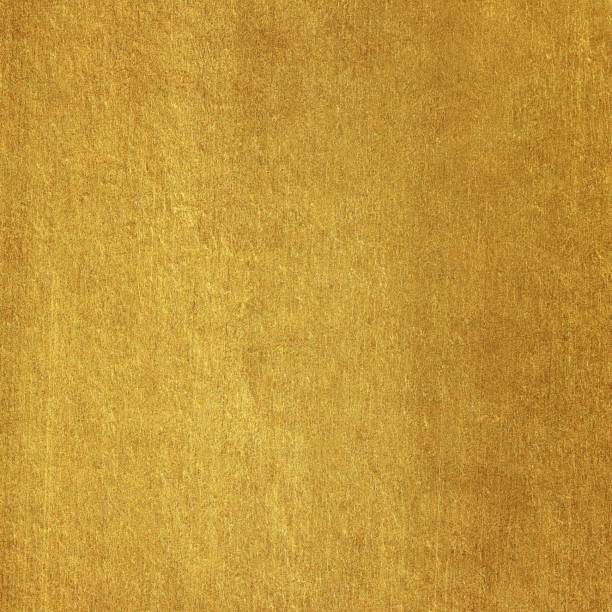 istock Shiny yellow leaf gold foil texture background 1192631799
