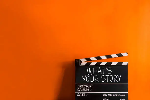 Photo of What's your story.world title on film slate