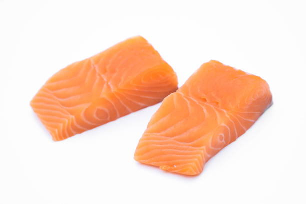 istock fresh raw salmon fillets isolated on white background 1192635060