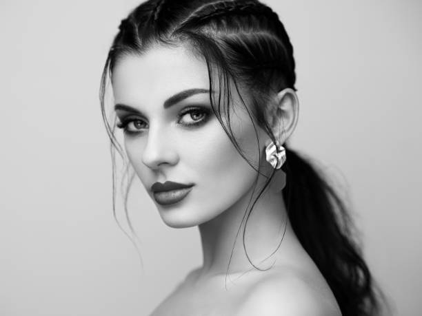 Portrait beautiful woman with jewelry Brunette girl with perfect makeup. Beautiful model woman with curly hairstyle. Care and beauty hair products. Lady with braided hair. Model with jewelry. Black and white photo weaving photos stock pictures, royalty-free photos & images