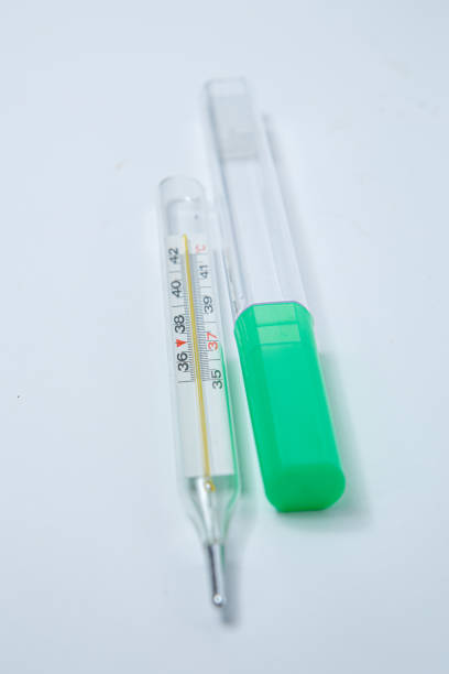 istock Mercury thermometer for measuring human body temperature 1192635919