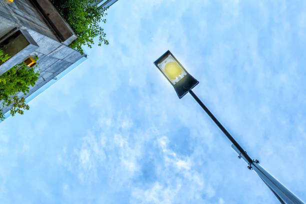 istock Street lamp against the blue sky. Bottom View Architecture. 1192636174