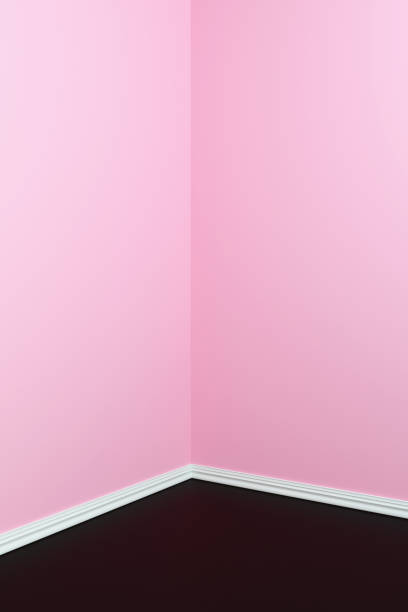 istock Empty corner with pink walls and black floor. Empty room studio gradient used for background and display your product. 3d illustration 1192637242