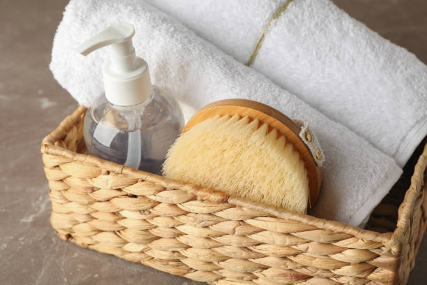 istock Basket with body care accessories on grey background, close up 1192639938