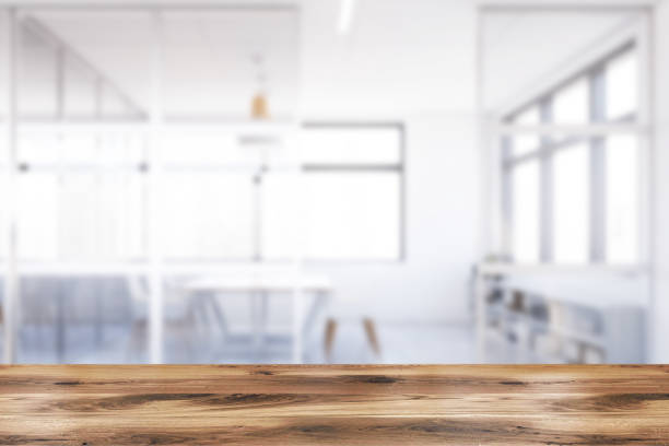 istock Table in blurry white meeting room 1192642112