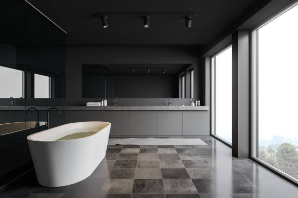 istock Gray and glass bathroom with double sink 1192642316