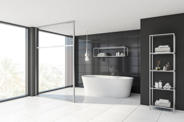 istock Gray tile and glass bathroom corner 1192642351