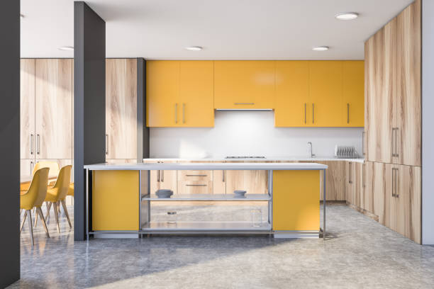 istock Gray kitchen interior with yellow island 1192643283