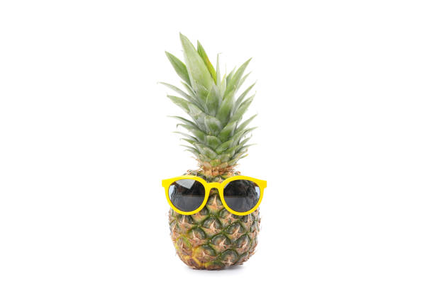 istock Pineapple with sunglasses isolated on white background. Juicy fruit 1192644468