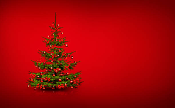 istock Beautiful decorated Christmas tree isolated on red background 1192644559