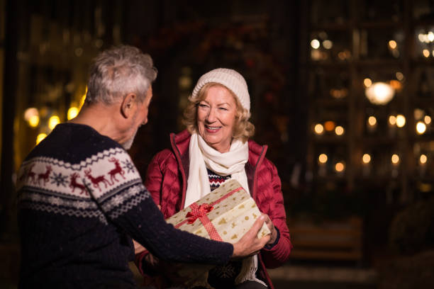 istock Older man wearing christmas sweater 1192644730