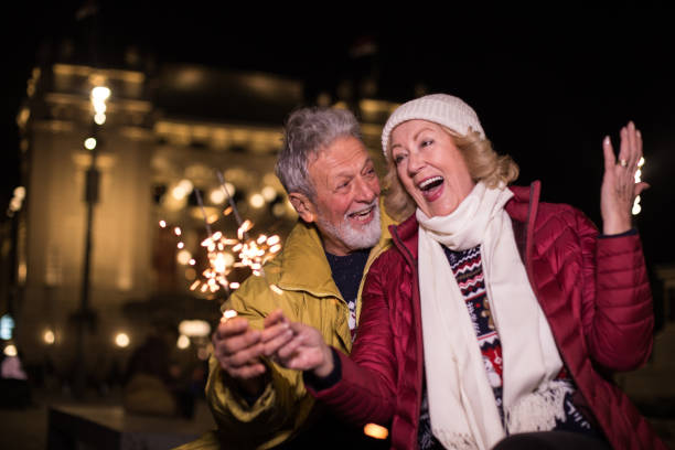 istock Man and woman celebrating together 1192644770