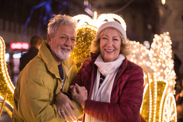 istock Couple standing outside and smiling 1192644778