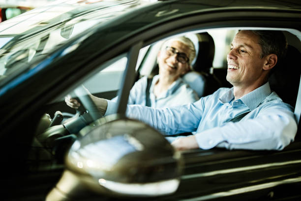 istock Happy couple going on a road trip by car. 1192646972