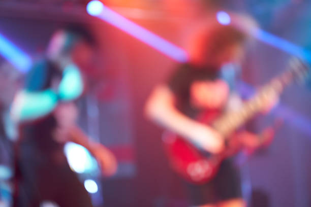 istock Guitar player on the stage - out of focus 1192646985