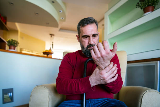 istock Sick Man in Armchair at Home 1192652554