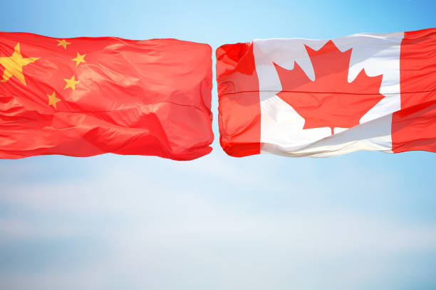 istock Flags of China and Canada 1192652953
