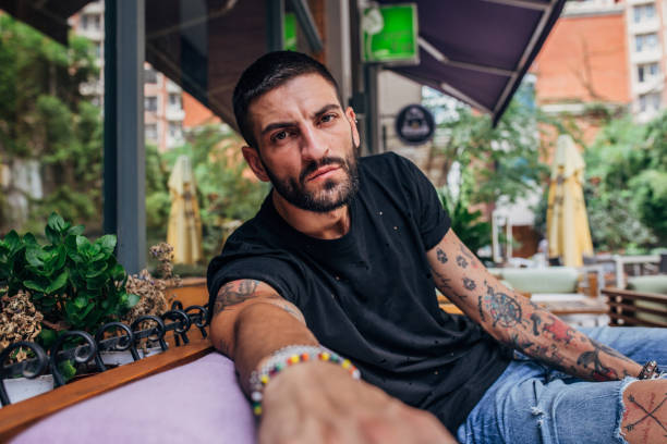 istock Handsome guy with tattoos portrait 1192653966